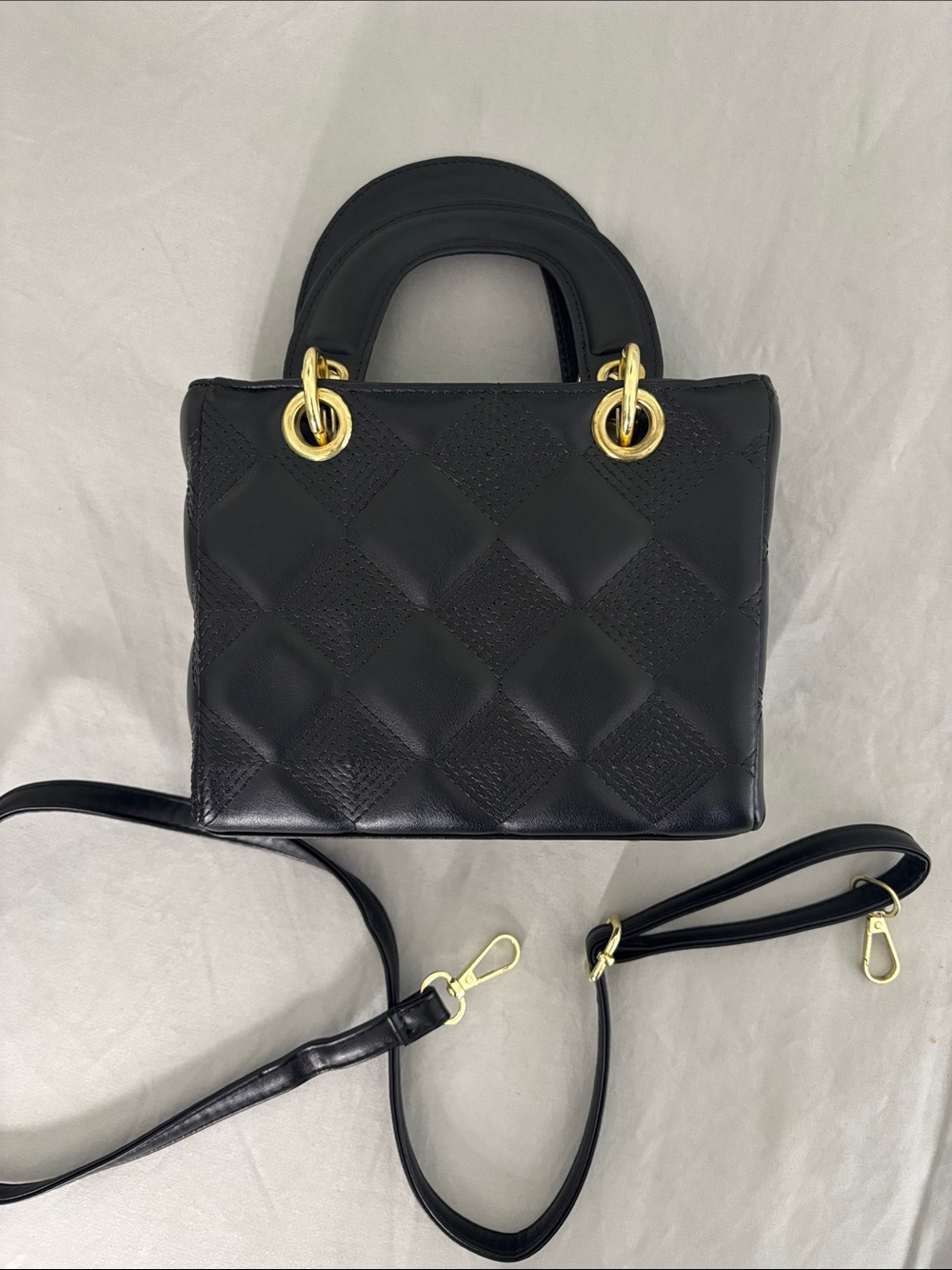 Black Quilted Leather Top-Handle Crossbody Bag with Gold Hardware